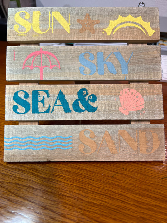 Sun Sky Sea & Sand sign